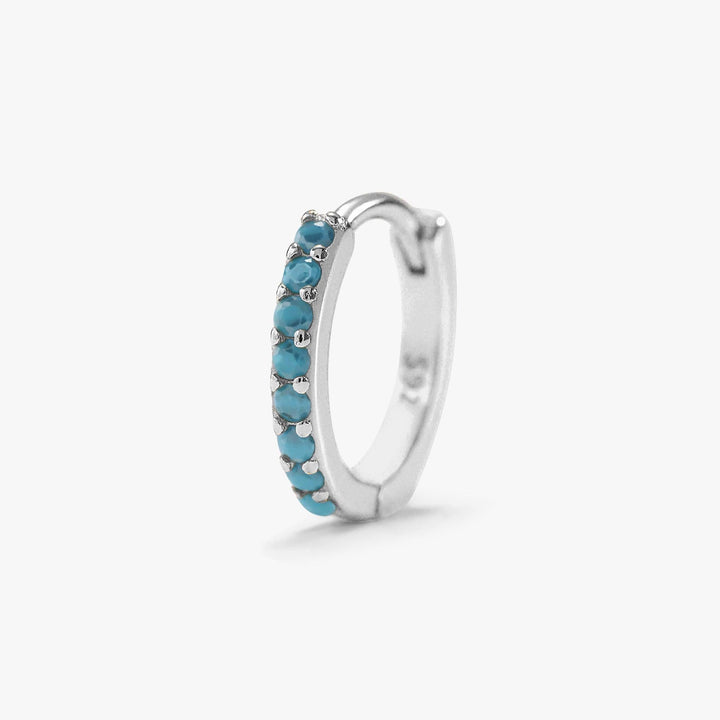 Boucles d'oreilles créoles avec pierres précieuses Boucles d'oreilles créoles avec pierres précieuses