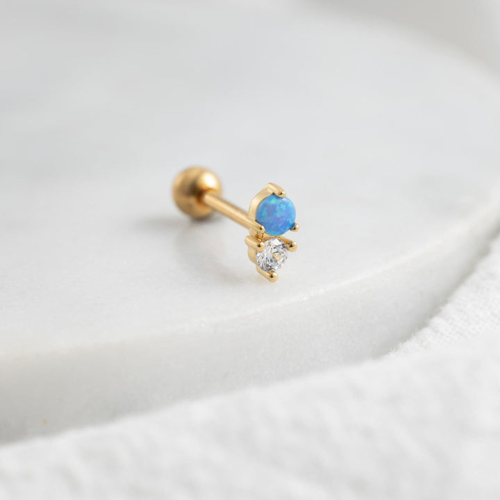 Boucle d'oreille piercing à dos plat avec double pierre opale bleue