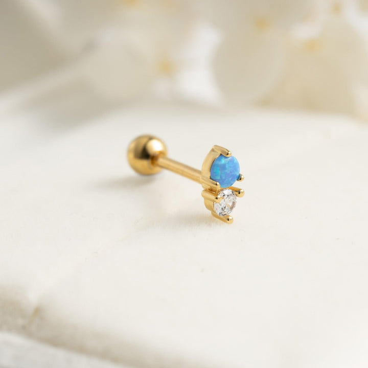 Boucle d'oreille piercing à dos plat avec double pierre opale bleue